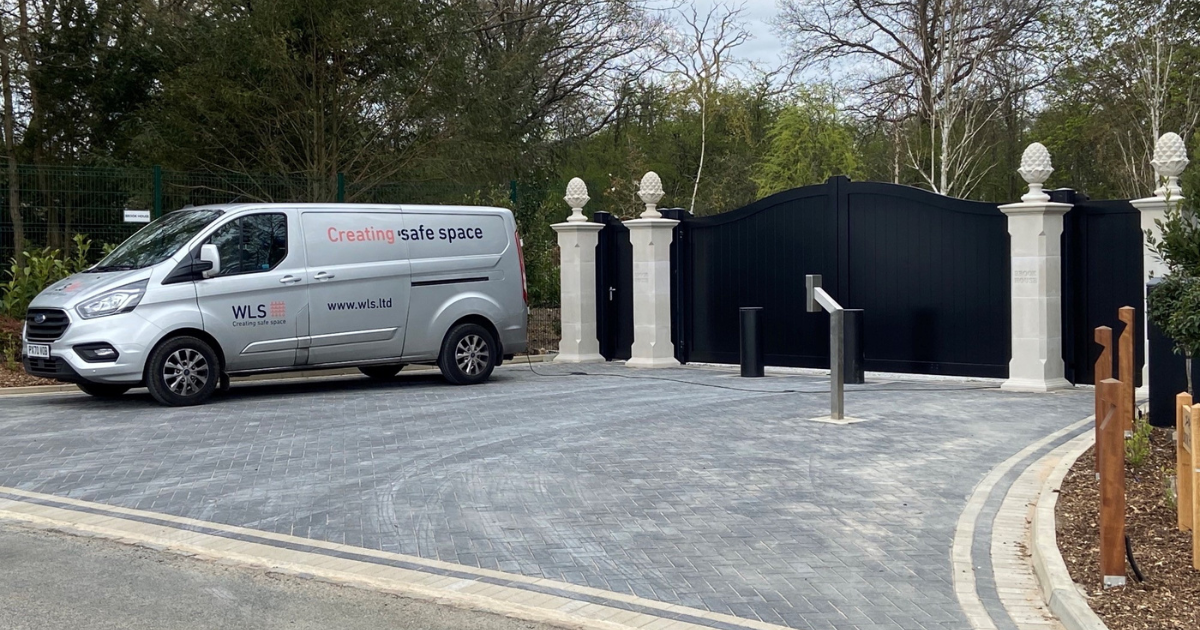 automatic electric gates installed by WLS with a WLS van outside